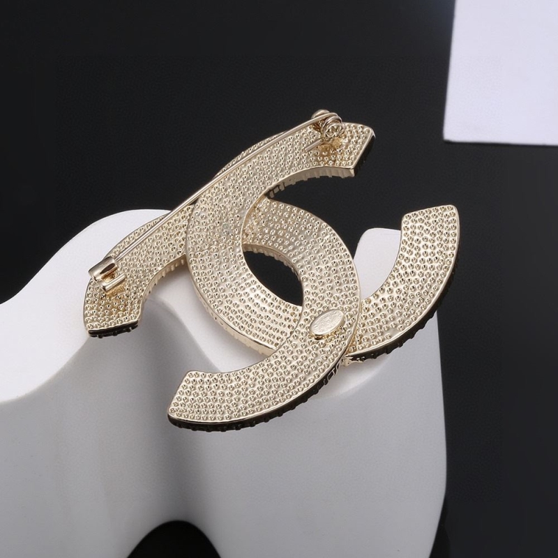 Ch**el brooches